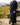 Little Hatta Kandura – Boys' Navy Tassel Emirati Thobe, walking toward camera – Thobe Wala