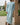 Mirfa Kandura – Men's Light Blue Tassel Emirati Thobe, three-quarter stand – Thobe Wala