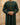 Dark green Emirati kandura with braided tassel, beige sandstone