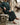 Dibba Kandura – Men's Dark Green Tassel Emirati Kandura, walking toward camera – Thobe Wala